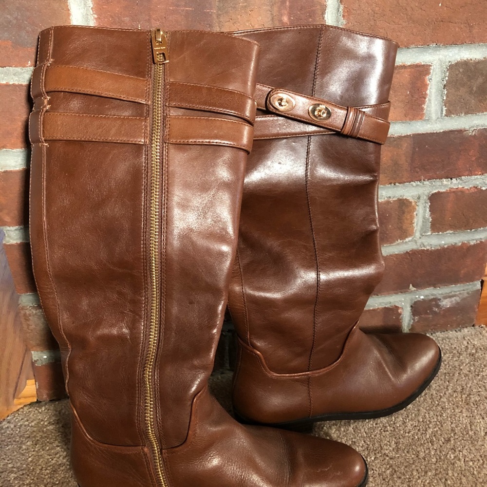 Coach woman’s Linette tall brown leather boots.